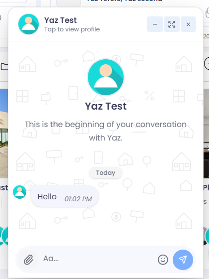 A chat window with the message box at the bottom: an attach (paperclip) button, the text field, an emoji button, and the send button.